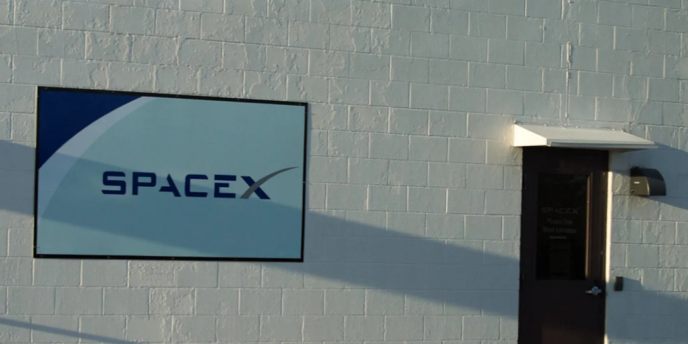 "Space X Building" by Nat W is licensed under CC BY-NC-SA 2.0.